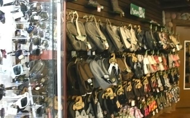Interior photo of sporting goods on displays in River Outfitters
