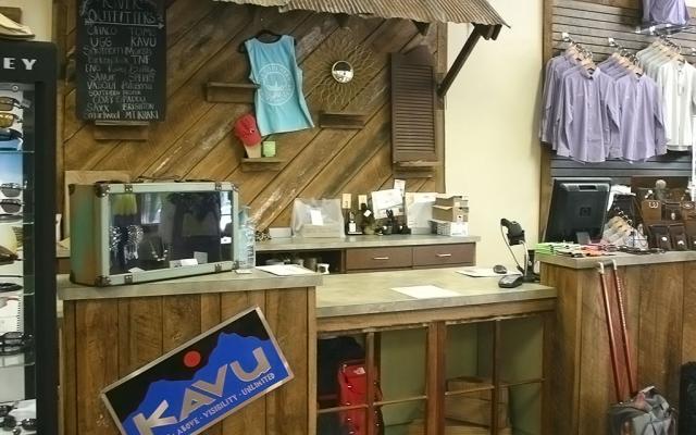 Interior photo of sporting goods on displays in River Outfitters